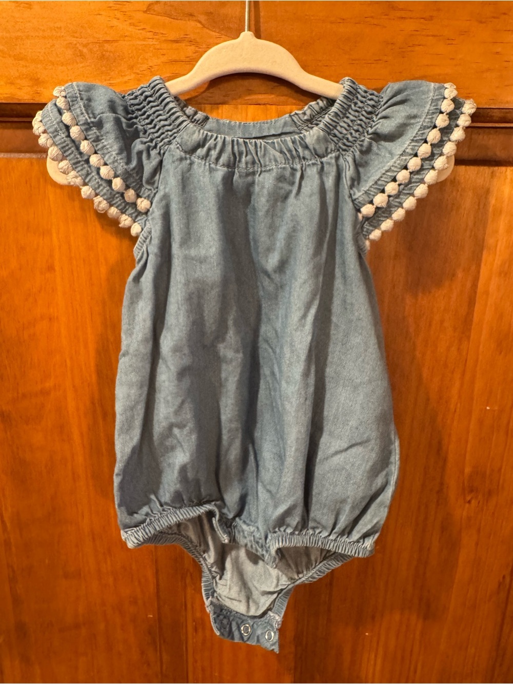 Chambray Bubble Romper with Pom Trim